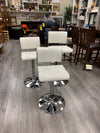 3 ADJUSTABLE WHITE FAUX LEATHER BAR STOOLS