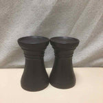 2 BLACK CANDLE HOLDERS
