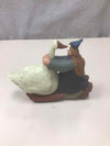 VINTAGE GIRL HUGGING GOOSE FIGURINE