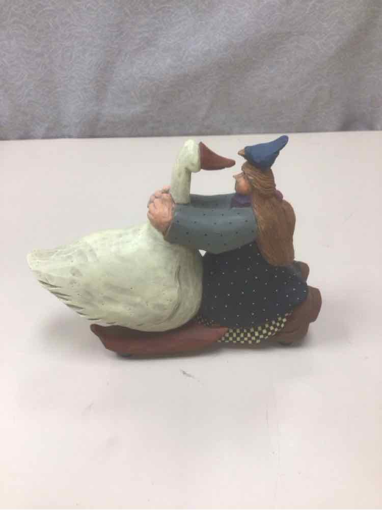 VINTAGE GIRL HUGGING GOOSE FIGURINE