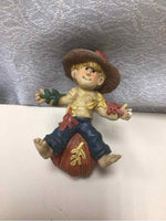 BOY ON PUMPKIN