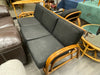 RATTAN SOFA W/BLACK CUSHIONS