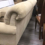 TAN UPHOLSTERED COUCH