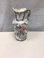 SMALL ORNATE FLORAL PITCHER