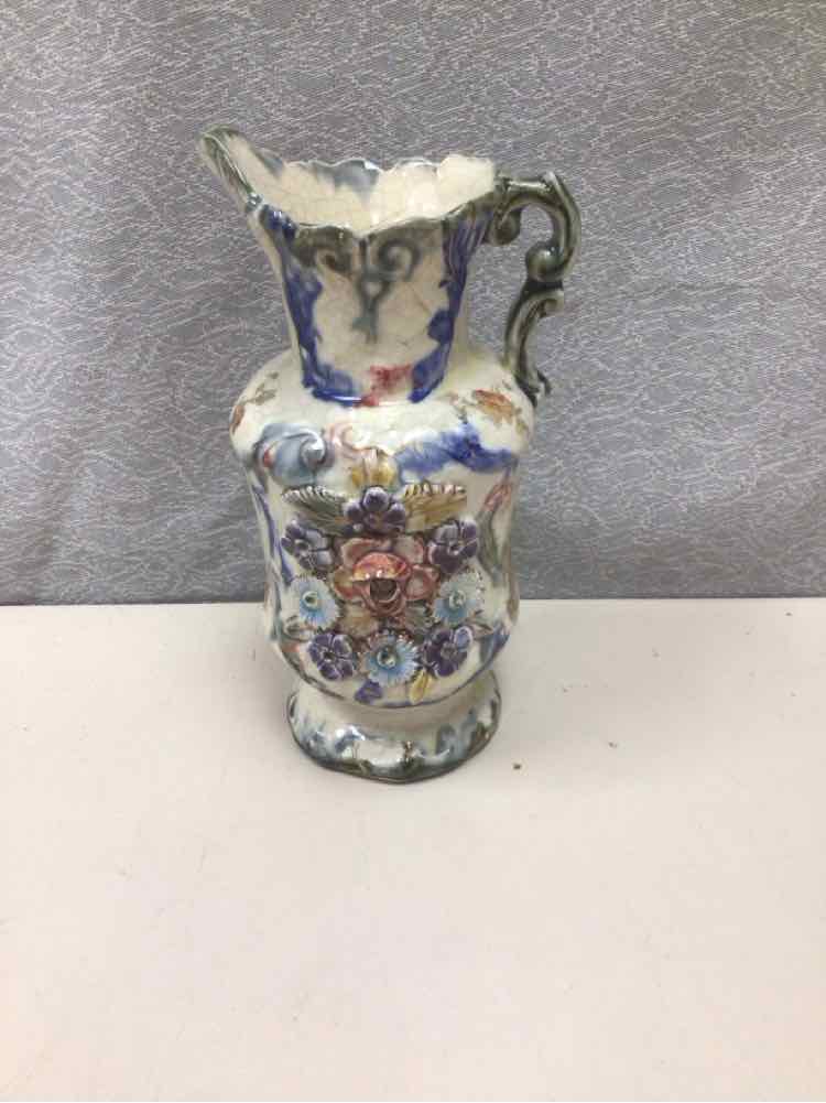 SMALL ORNATE FLORAL PITCHER