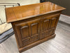 BROWN WOOD FLIP TOP CREDENZA