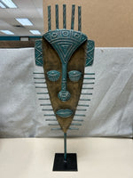 GREEN METAL MASK ON STAND