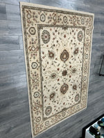 TAN BROWN GREEN RUG