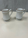2 CREAM BROWN RIM MUGS