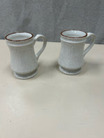 2 CREAM BROWN RIM MUGS